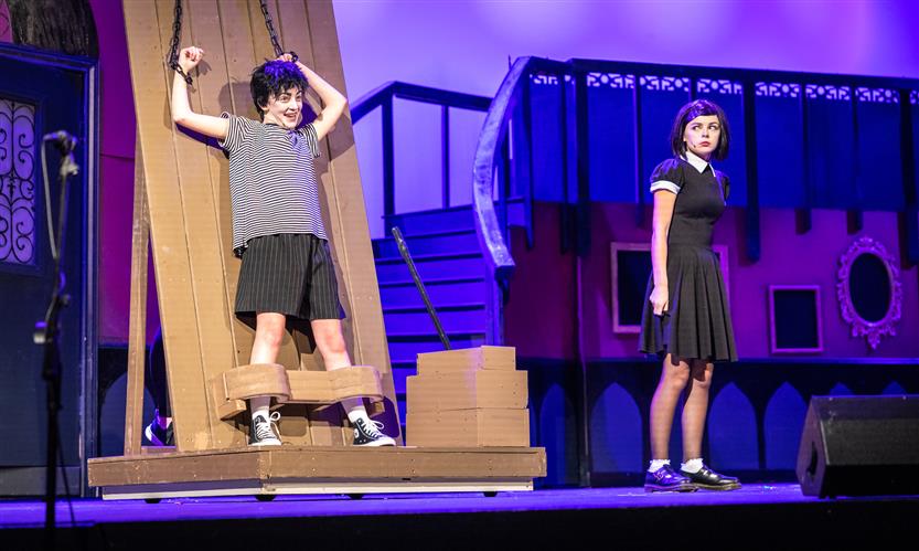 Students perform onstage
